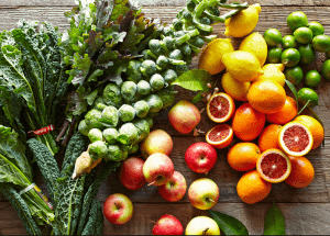a group of fruits and vegetables on a wood surface Healthy Weight Loss Diets Cardiff
